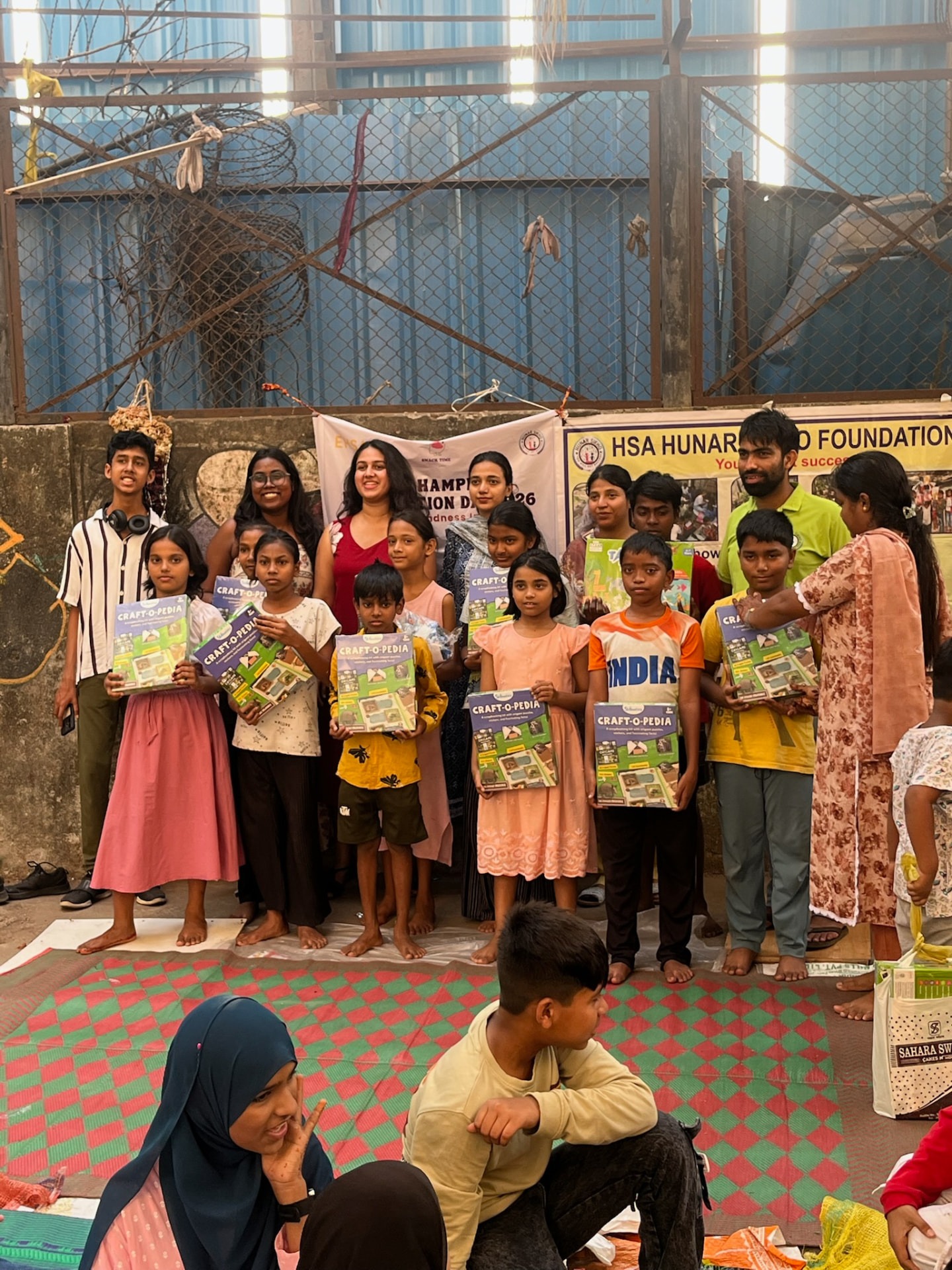 Children and community, gathered for giving